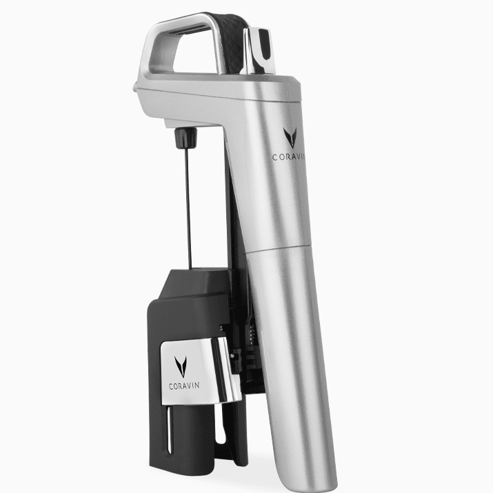 Coravin wine access tool in silver and black, designed for pouring wine without removing the cork.