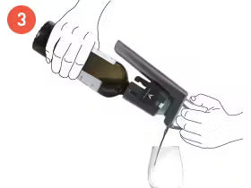Step 3: Pouring wine from a bottle into a glass using an aerator tool.