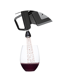 Wine flowing from a tap into a clear glass, creating bubbles in the rich red liquid.